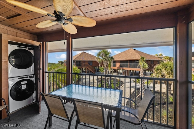 1811 Olde Middle Gulf Dr Unit 10, Sanibel, FL 33957 - exterior space with stacked washer / dryer and ceiling fan