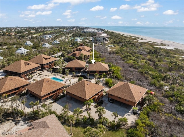 1811 Olde Middle Gulf Dr Unit 10, Sanibel, FL 33957 - birds eye view of property featuring a water view and a beach view