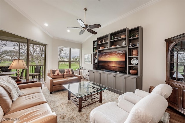 living room with crown molding, lofted ceiling, recessed lighting, a ceiling fan, and light wood-type flooring