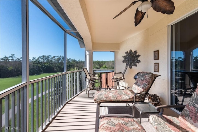 balcony featuring a ceiling fan