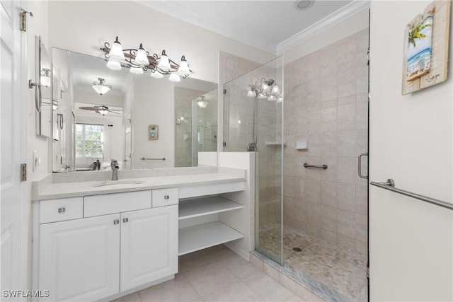 bathroom featuring a ceiling fan, tile patterned flooring, a shower stall, crown molding, and vanity