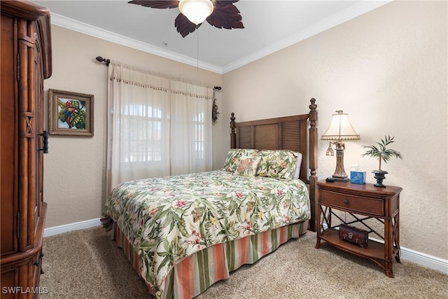 bedroom featuring baseboards, carpet, ceiling fan, and crown molding