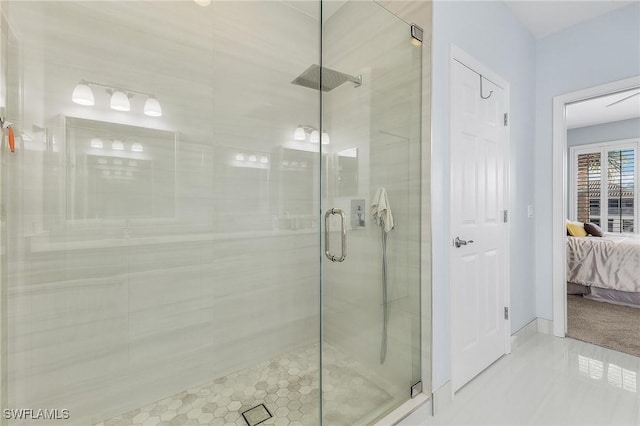 bathroom with a shower stall and ensuite bathroom