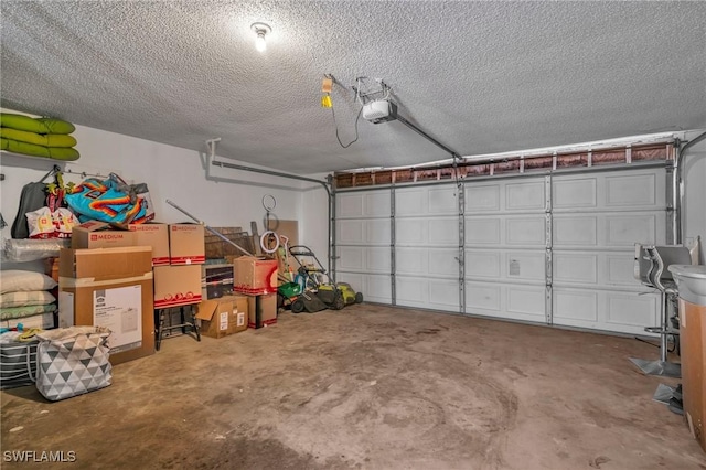 garage featuring a garage door opener