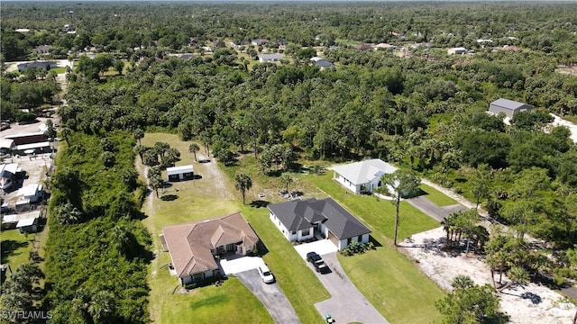 bird's eye view featuring a forest view