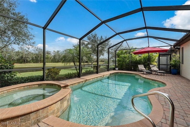 view of swimming pool with glass enclosure, a pool with connected hot tub, and a patio