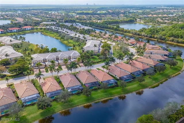 aerial view featuring a residential view and a water view