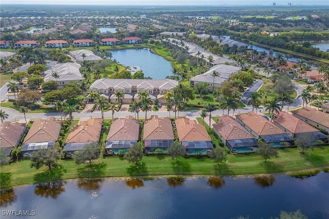 aerial view featuring a water view and a residential view