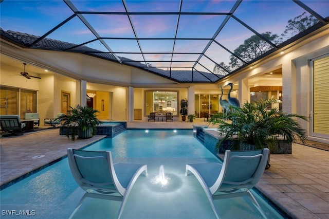 view of swimming pool with a pool with connected hot tub and a patio