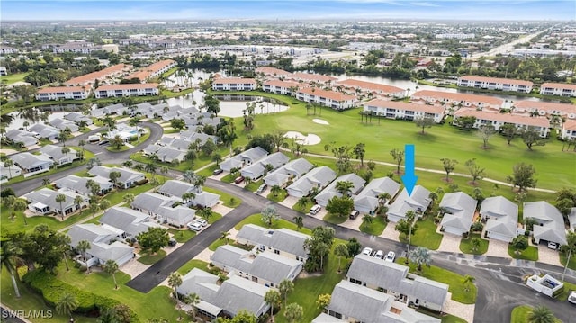 birds eye view of property featuring a residential view and golf course view