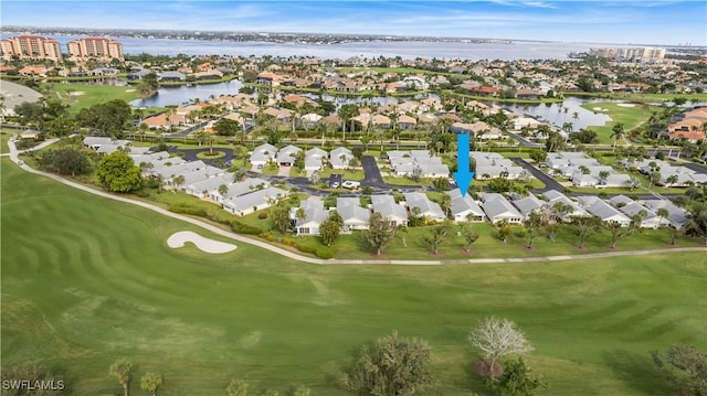 aerial view featuring a water view, a residential view, and golf course view