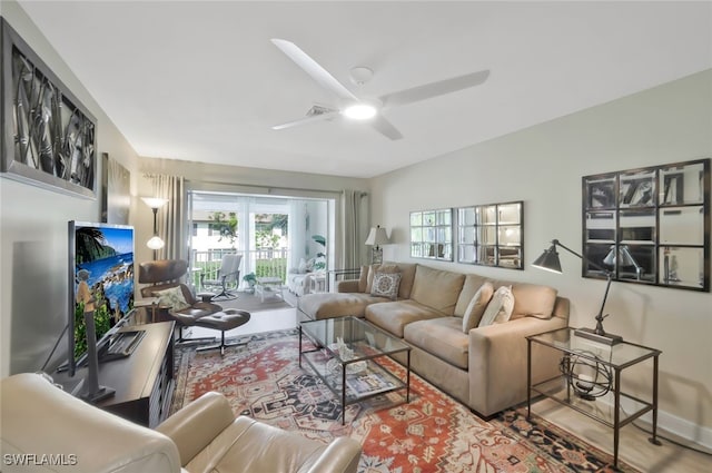 living area featuring ceiling fan