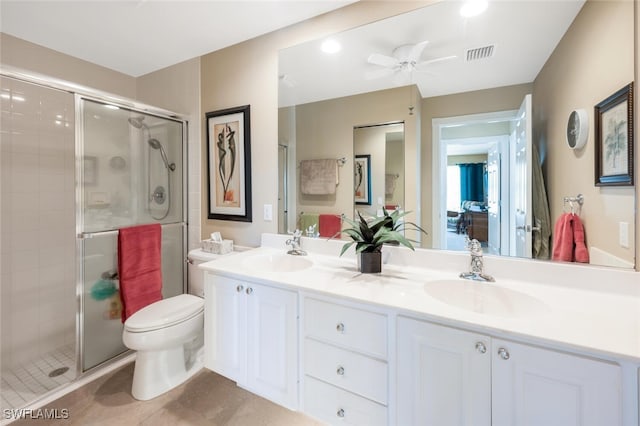 bathroom featuring a stall shower, visible vents, and a sink