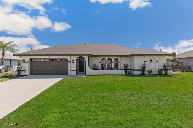 view of front facade featuring a front yard, concrete driveway, an attached garage, and stucco siding