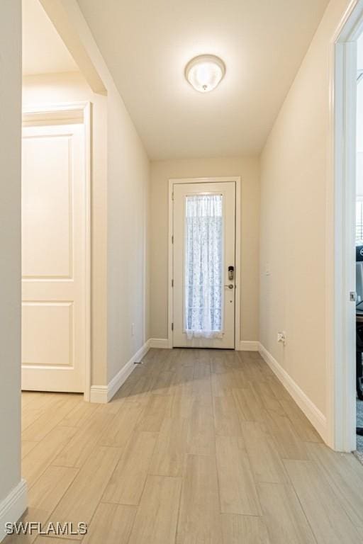 entryway with light hardwood / wood-style flooring