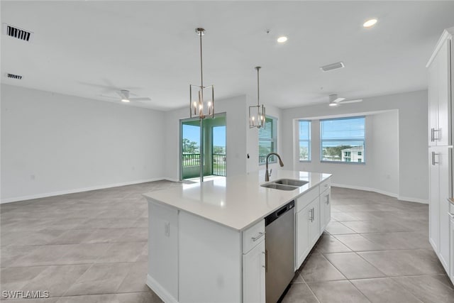 kitchen featuring a sink, visible vents, and dishwasher