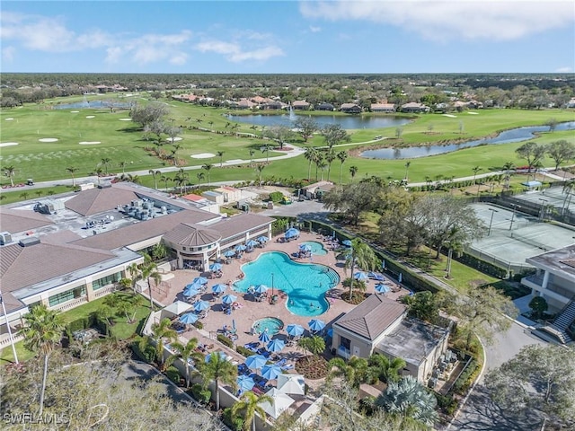 bird's eye view with view of golf course and a water view