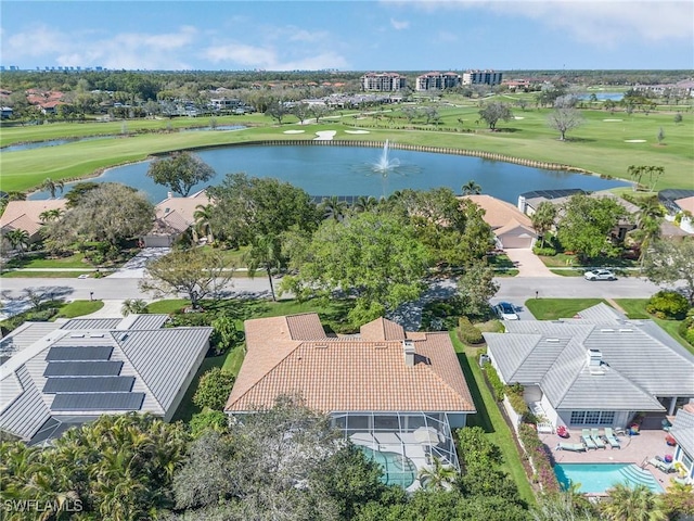 bird's eye view with a water view and golf course view