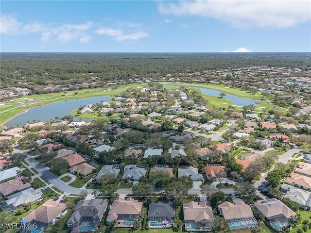 bird's eye view featuring a water view, a residential view, and golf course view