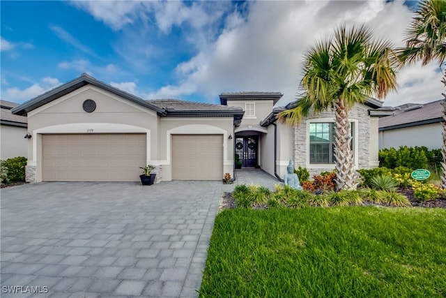 view of front of house with a garage