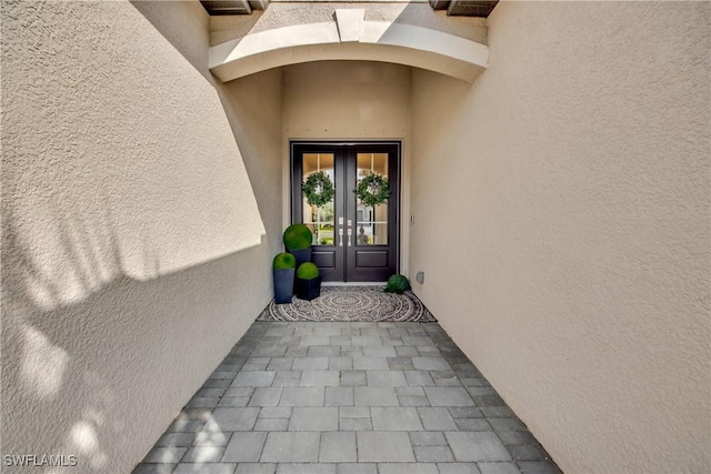 doorway to property with french doors