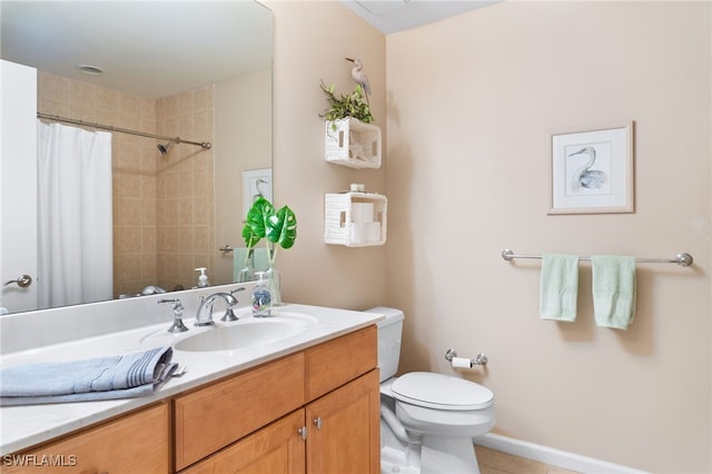 full bathroom featuring a shower with curtain, toilet, vanity, tile patterned flooring, and baseboards