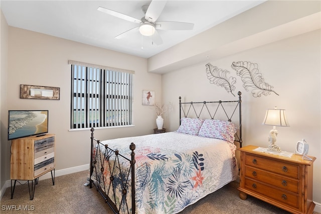 bedroom featuring carpet floors, baseboards, and a ceiling fan