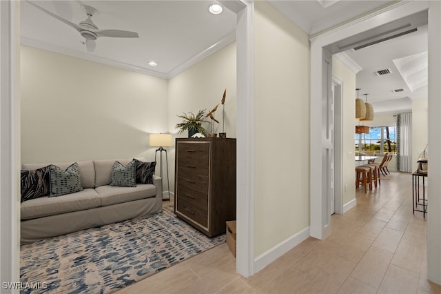 living area featuring crown molding, recessed lighting, visible vents, a ceiling fan, and baseboards