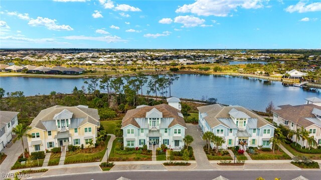 aerial view with a water view and a residential view