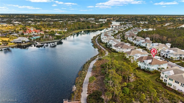 aerial view with a water view and a residential view