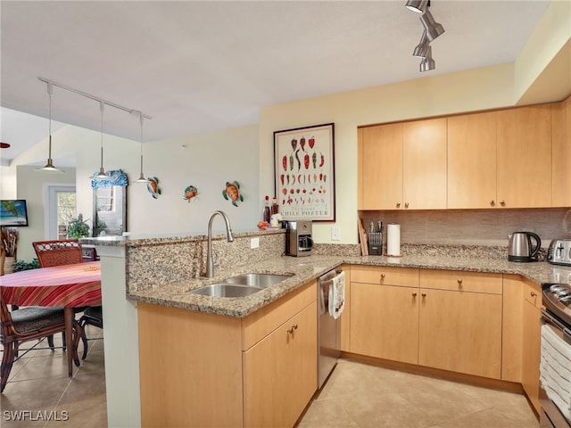 kitchen with sink, backsplash, light brown cabinets, kitchen peninsula, and hanging light fixtures