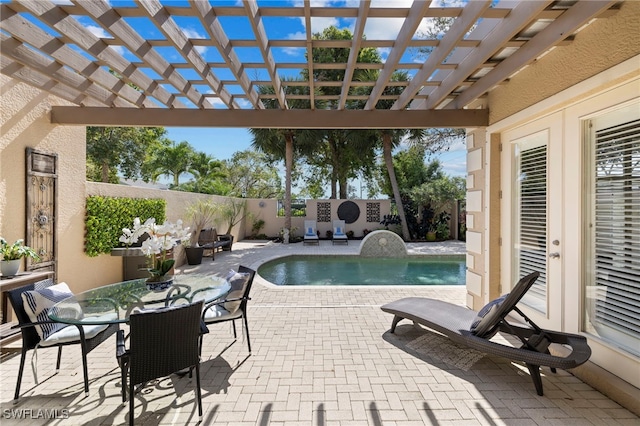 view of swimming pool with a fenced backyard, a pergola, and a patio area