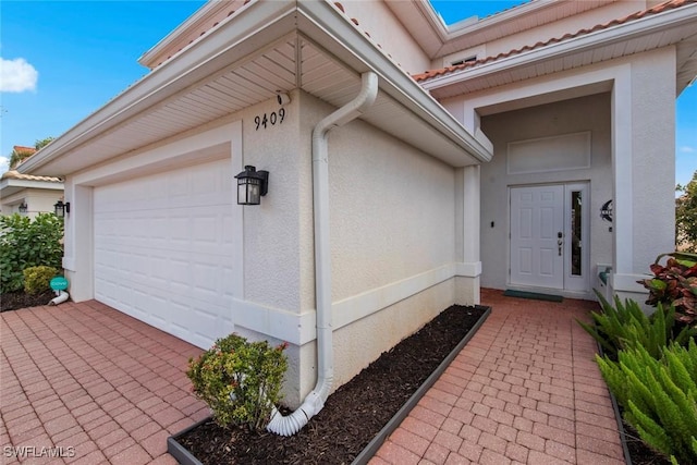 garage with driveway