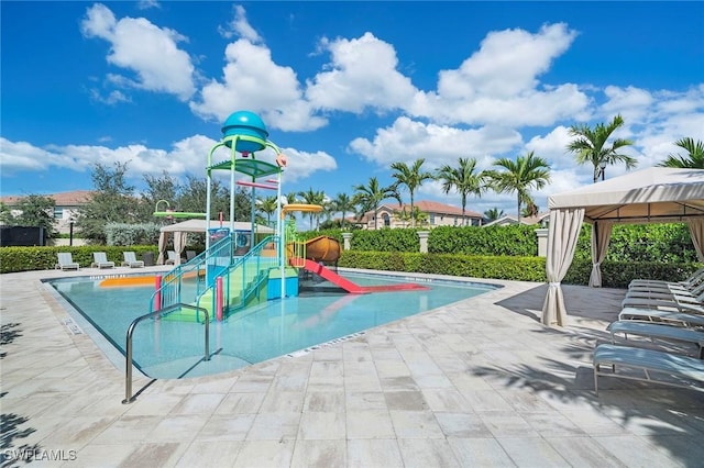 13789 Callisto Ave, Naples, FL 34109 - community pool with a water play area and a gazebo