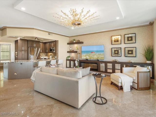 living room with marble finish floor, recessed lighting, and crown molding