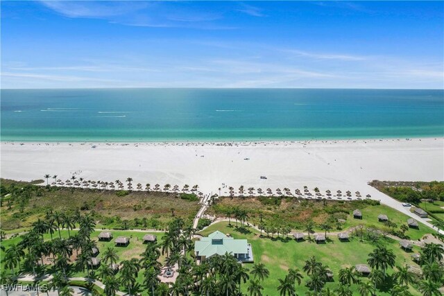 aerial view featuring a beach view and a water view