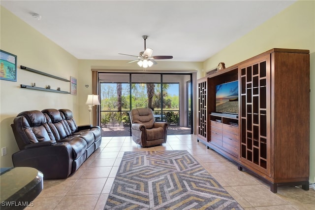 living room with light tile patterned flooring and a ceiling fan