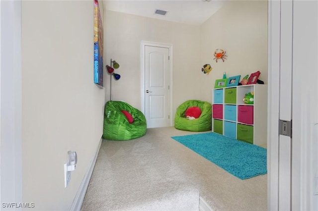 game room featuring carpet floors and visible vents