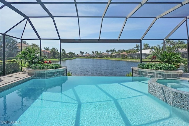 view of swimming pool featuring a water view, glass enclosure, and a pool with connected hot tub