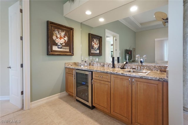 bathroom featuring tile patterned flooring, recessed lighting, beverage cooler, vanity, and baseboards