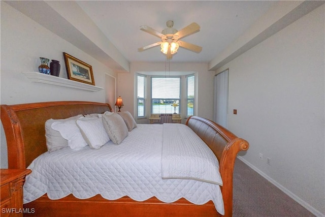 bedroom with carpet, baseboards, and a ceiling fan