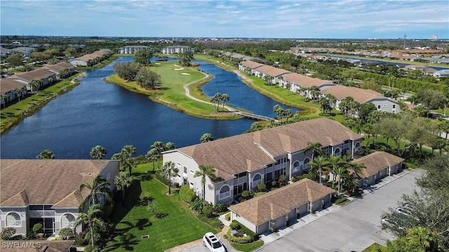 aerial view with a water view and a residential view