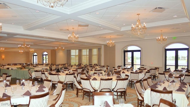 dining area featuring french doors, coffered ceiling, visible vents, and an inviting chandelier