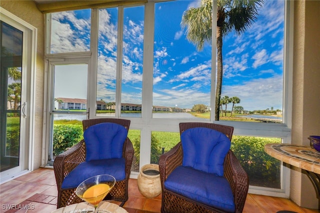 sunroom with a water view