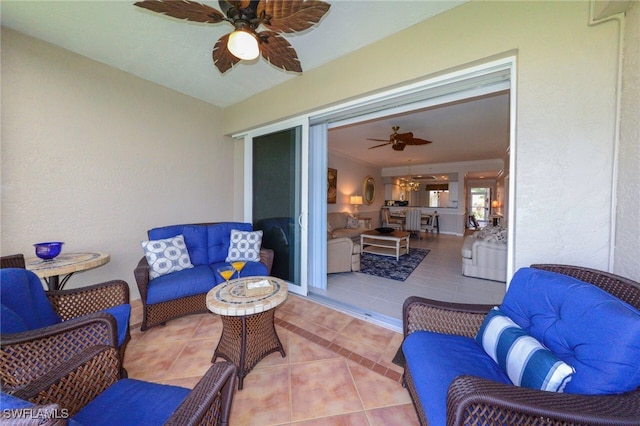 view of patio featuring ceiling fan