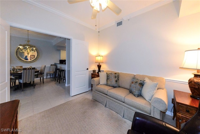 living room featuring light colored carpet, visible vents, ornamental molding, light tile patterned flooring, and ceiling fan