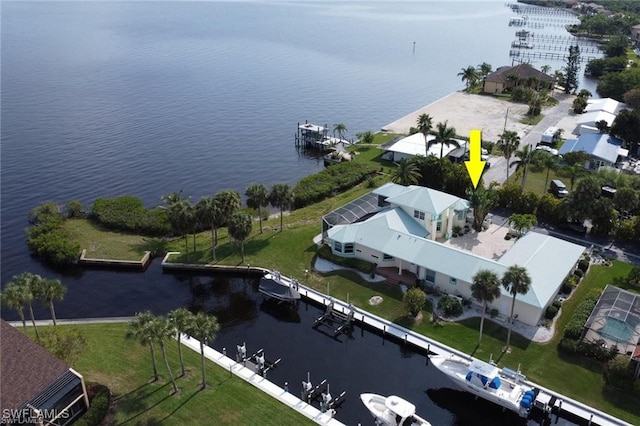 birds eye view of property featuring a water view