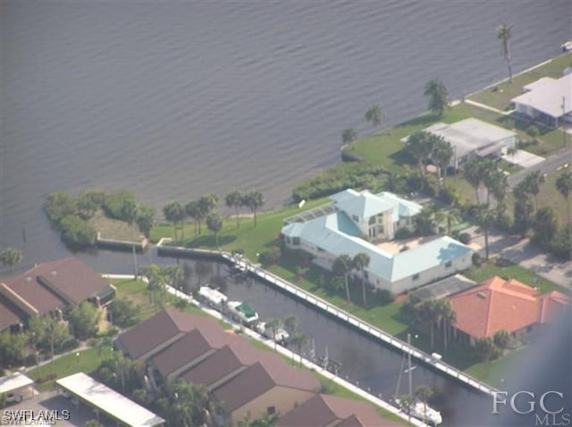 aerial view featuring a water view and a residential view