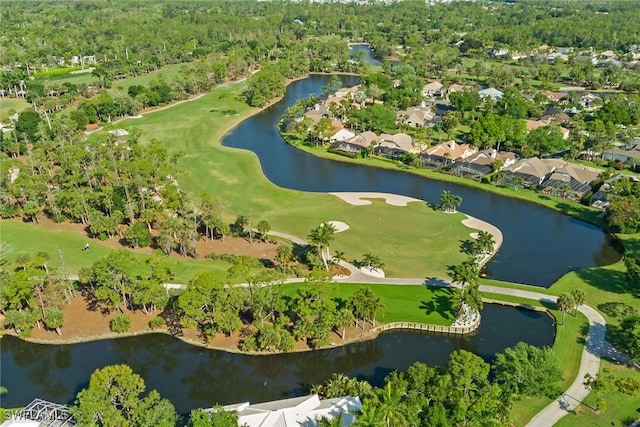 bird's eye view featuring view of golf course, a water view, and a wooded view