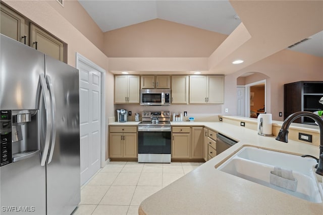 kitchen featuring light tile patterned floors, a sink, visible vents, light countertops, and appliances with stainless steel finishes